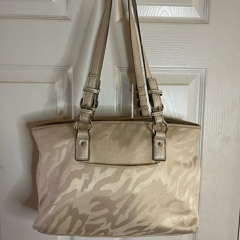 Dana  Buchman beige canvas and faux leather trims and accents shoulder bag.